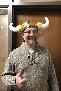 Teacher wearing a viking hat
